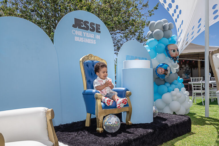 Portrait of a one-year-old boy at his birthday party by Katja Photography