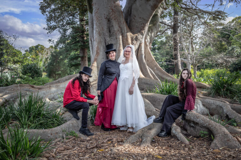 Couple and their two children on the wedding vow renewal day by Katja Photography